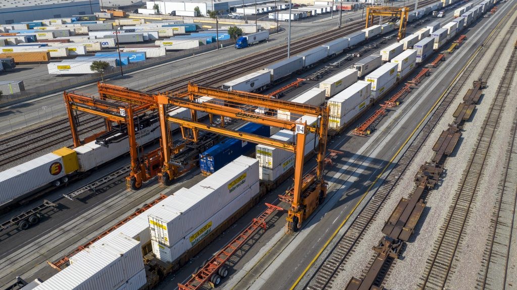 An arial view of J.B. Hunt intermodal containers at a rail yard.