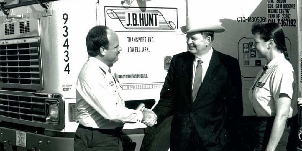 J.B. Hunt shaking hands with employees.