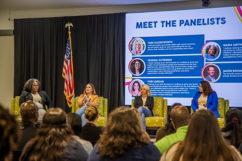 Panelists on stage at J.B. Hunt inclusion panel