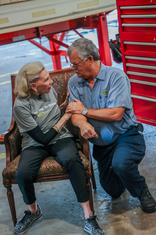 Mrs. Johnelle Hunt talking with J.B. Hunt employee at Technician Appreciation celebration. 