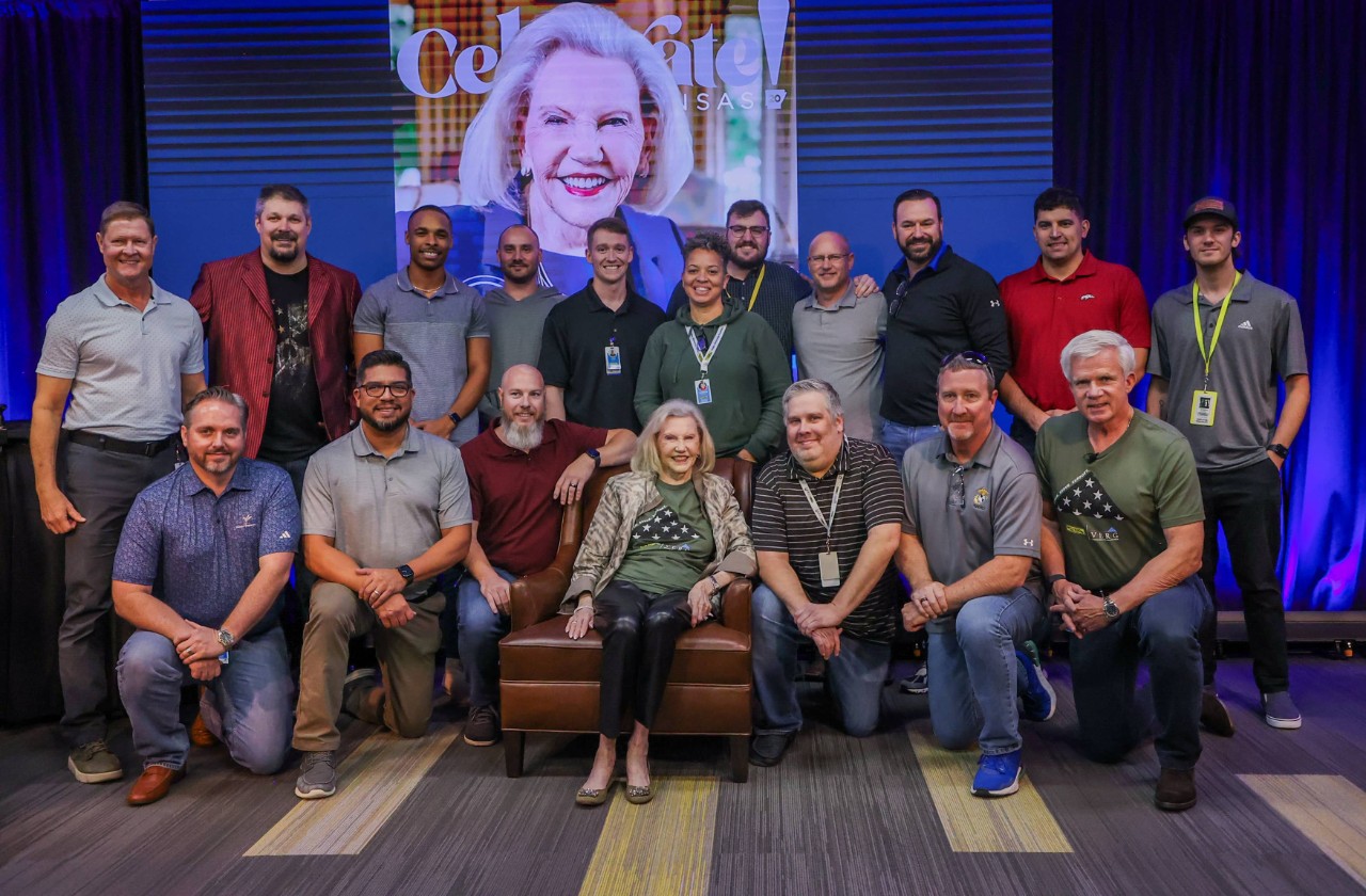 Members of the VERG employee resource group posing for a photo with Johnelle Hunt