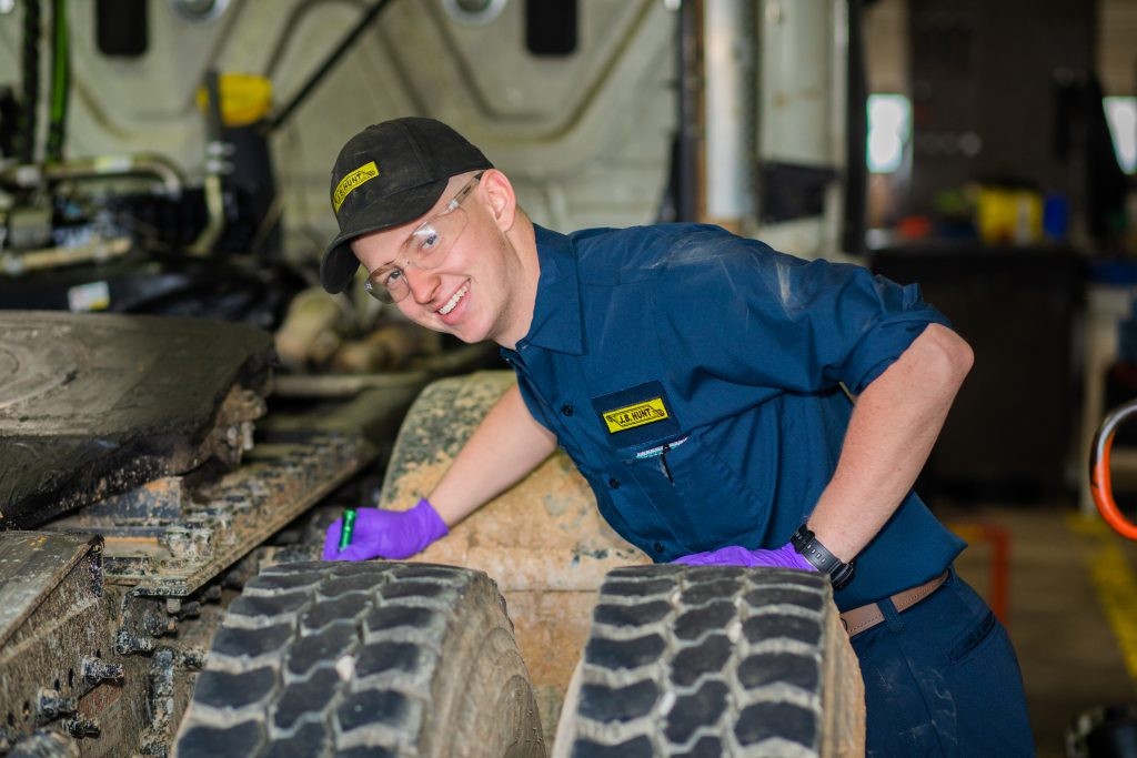 Joseph working on J.B. Hunt equipment.