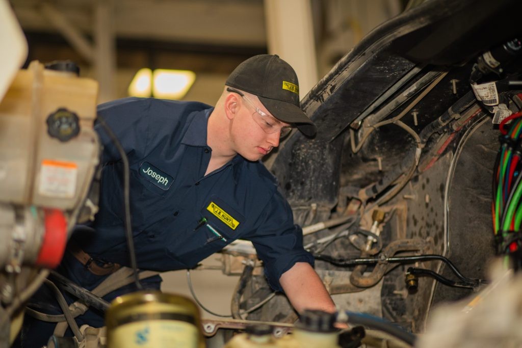 J.B. Hunt technician, Joseph, works on equipment.