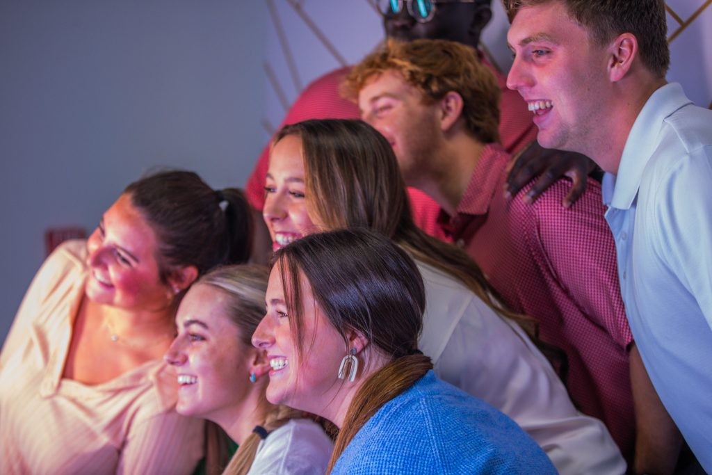 A group of J.B. Hunt interns pose for a photo