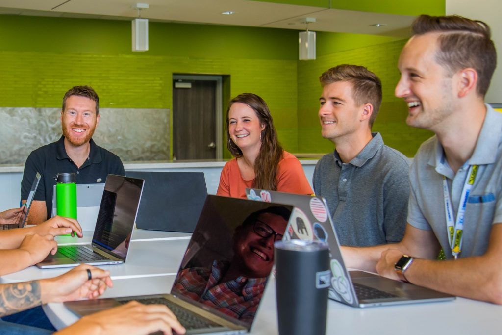 J.B. Hunt employees work together during meeting