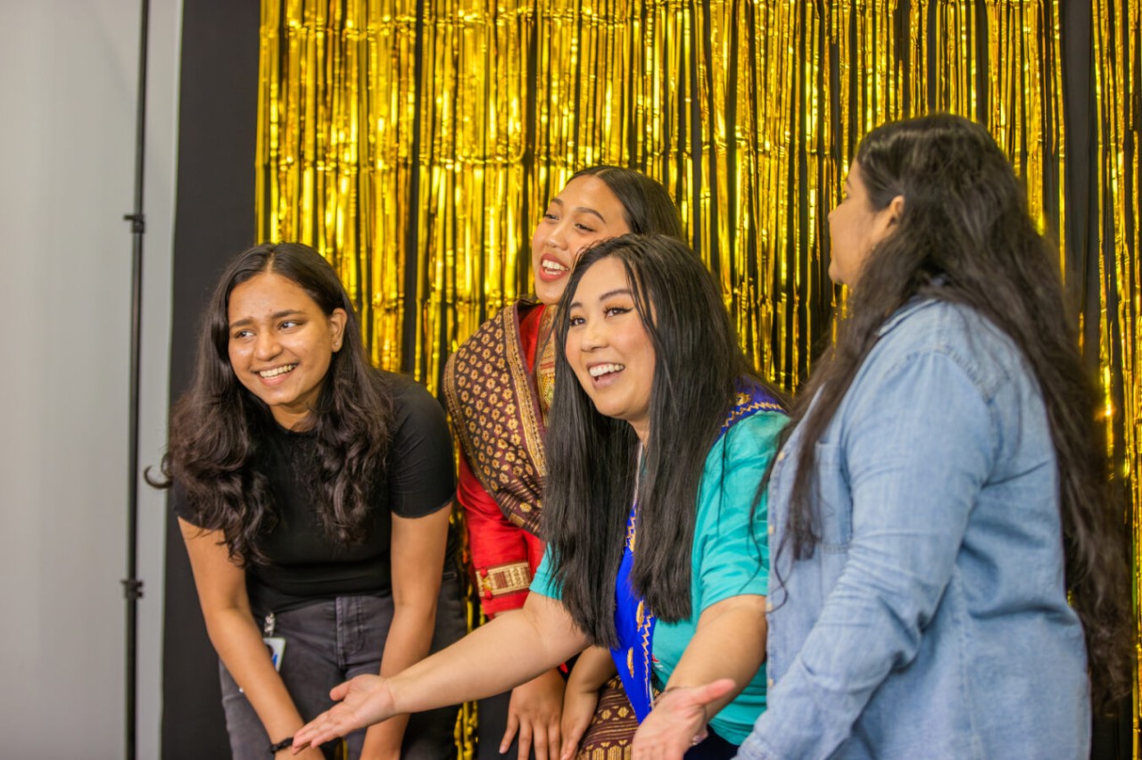 CAAPITAL members in the photo booth at the CAAPITAL's AAPI Heritage Month event at J.B. Hunt corporate campus.