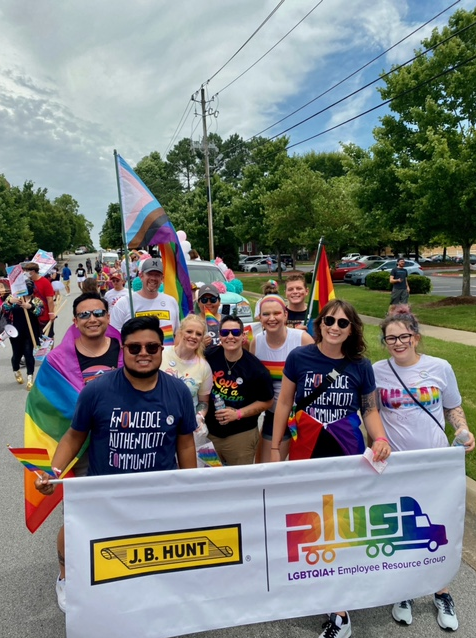 J.B. Hunt PLUS(+) ERG members walk in Fayetteville, Ark. Pride parade.