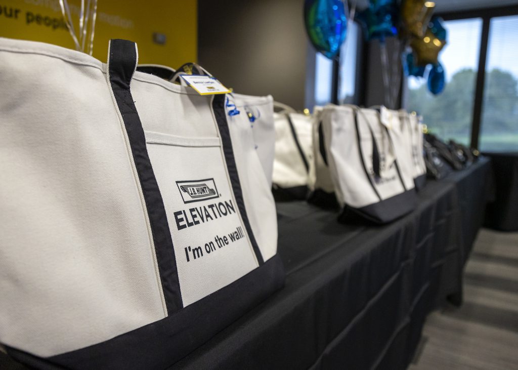 Gift bags with the ELEVATION logo.