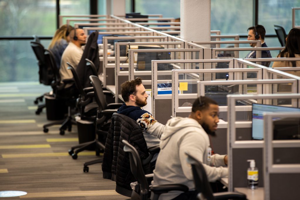 J.B. Hunt brokerage team working at their desks.