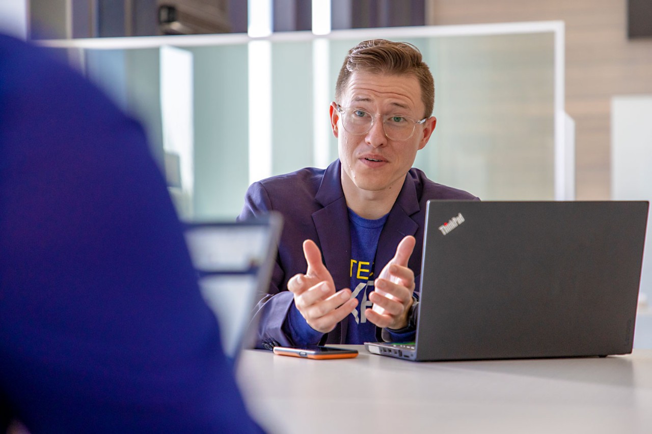 man talking in a meeting