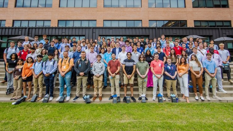 J.B. Hunt interns standing on stairs at J.B. Hunt headquarters